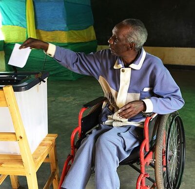 Person with disability voting in Rwanda.