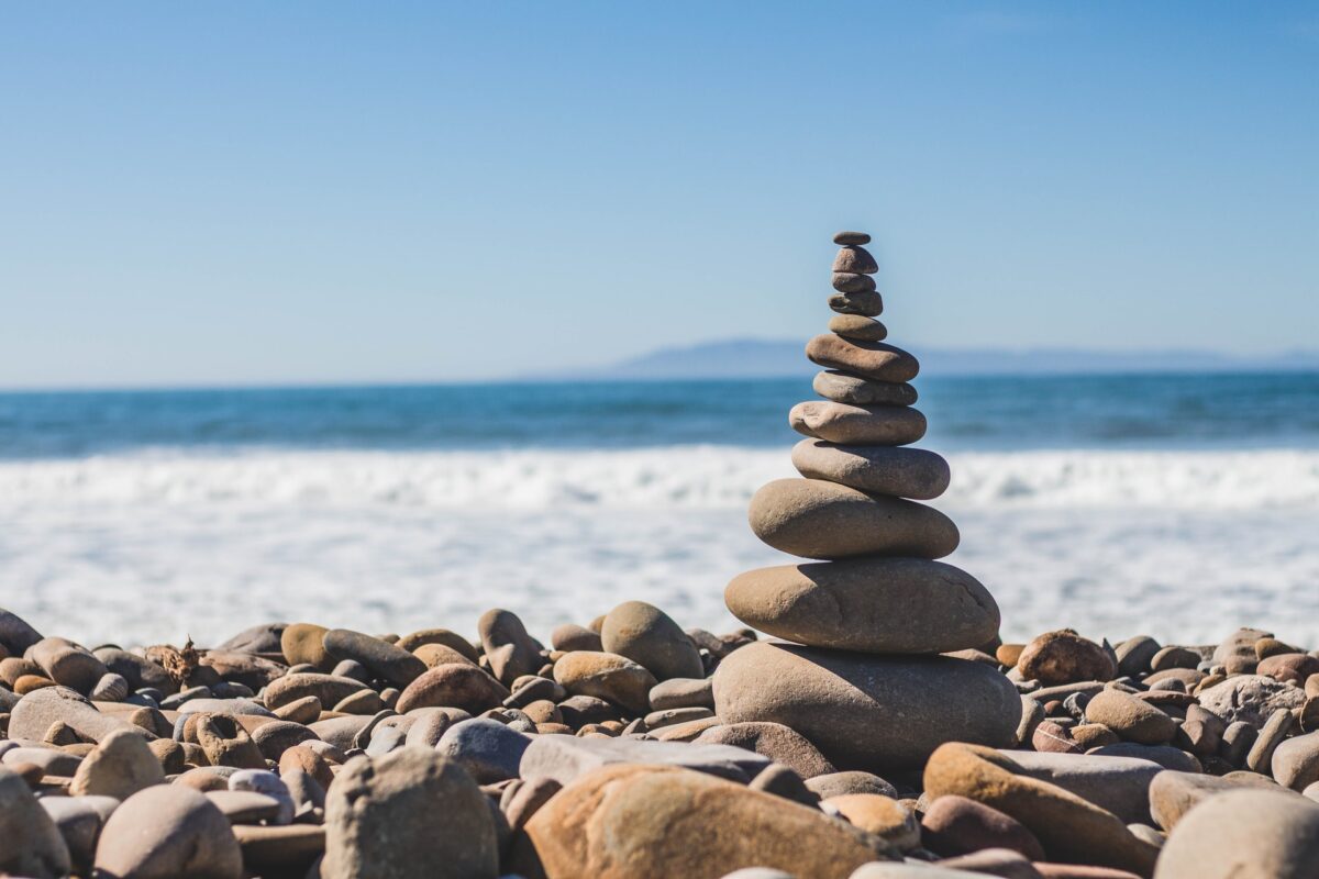 Rocks balancing by a beach