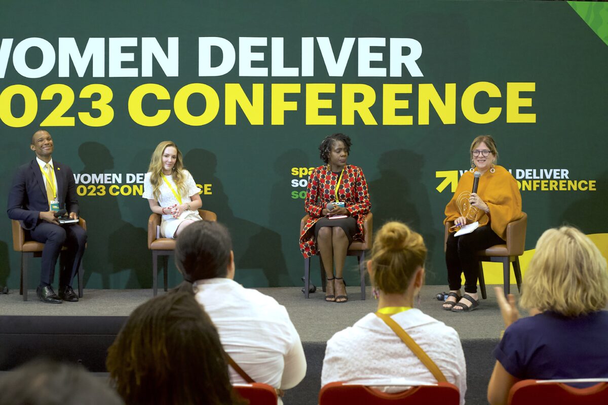 Image of Ida Jooste moderating a session at Women Deliver 2023